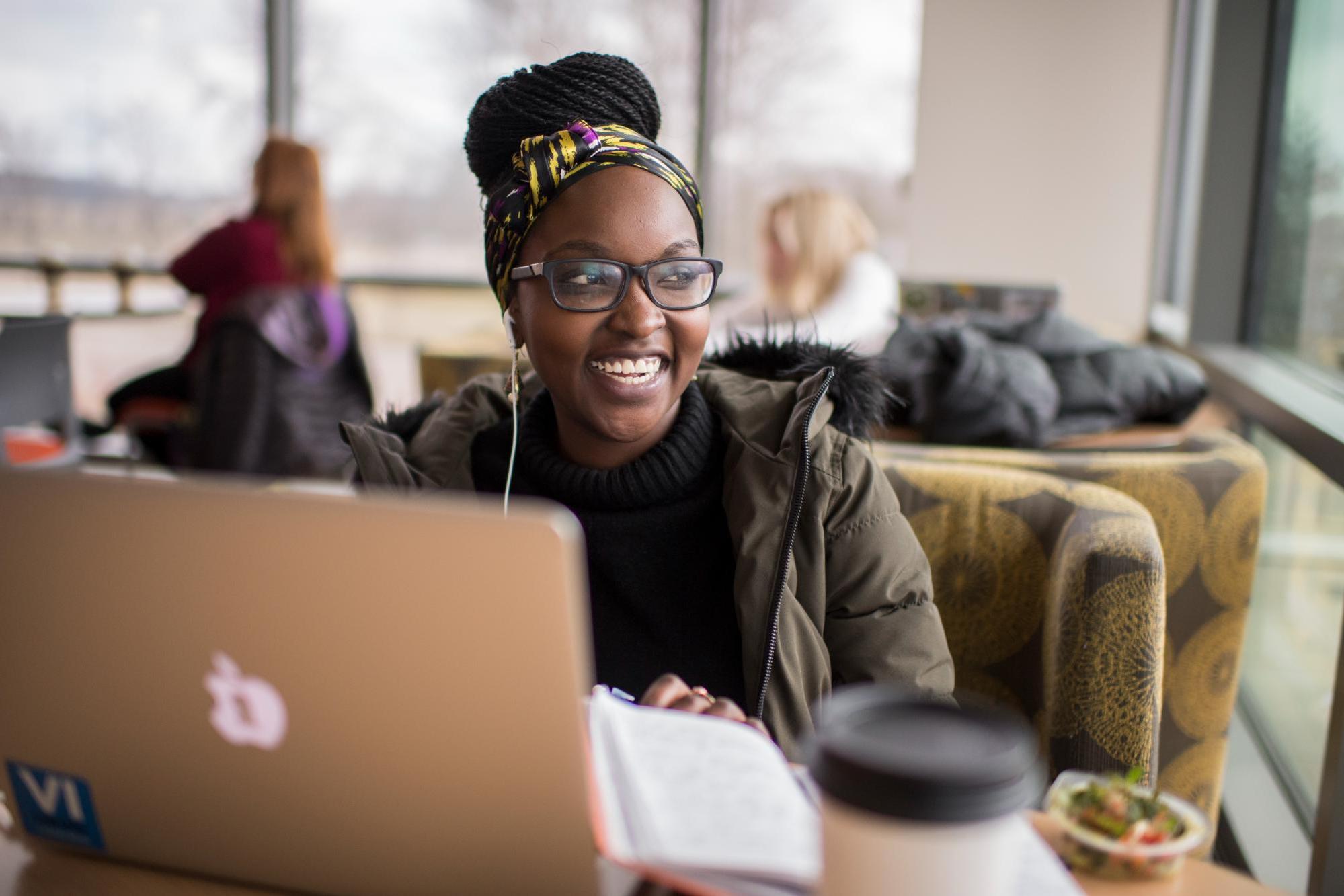 GVSU student at her computer.